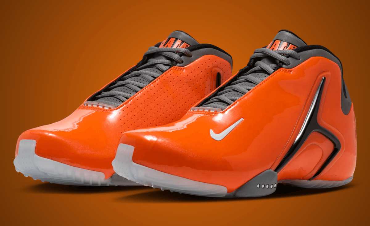On-foot view of the SLAM x Nike Hyperflight in orange patent leather, showcasing the high-gloss upper and Y2K-inspired design