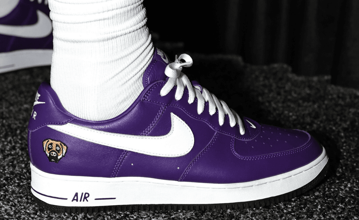 LeBron James wearing Victor Victor x Nike Air Force 1 '01 Low in purple with dog head logo on heel