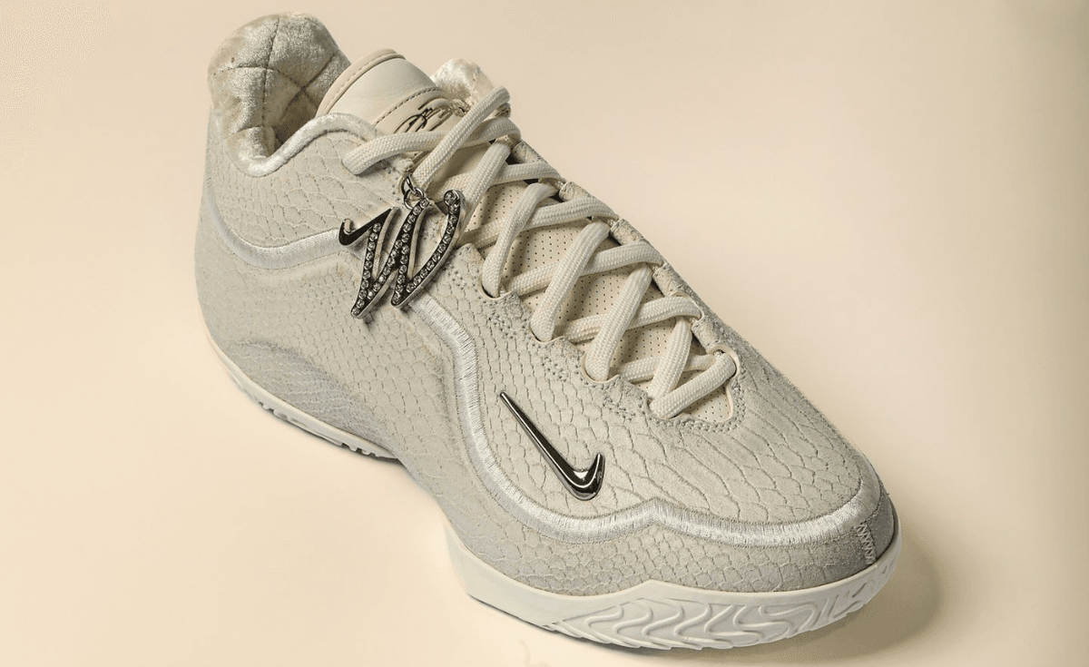 Nike LeBron 23 White Label PE with faux snakeskin upper, cream textile bands, and metallic silver accents