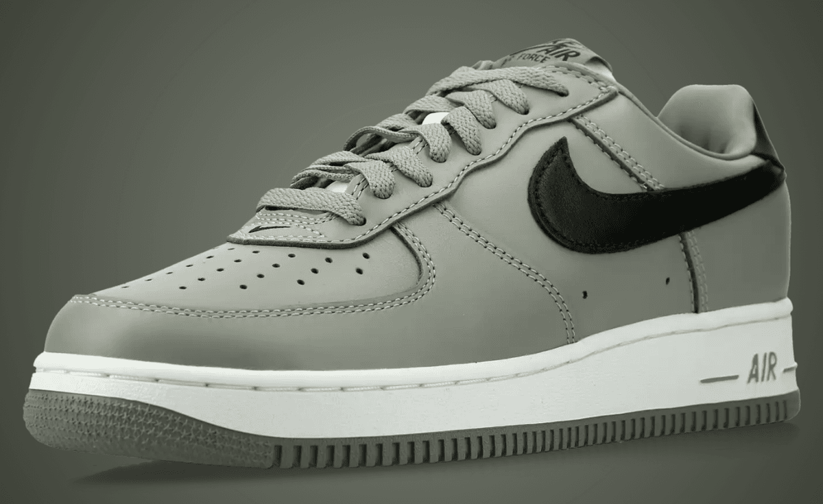 Nike Air Force 1 '01 in Light Army Grey leather, showing side profile with padded collar and classic silhouette