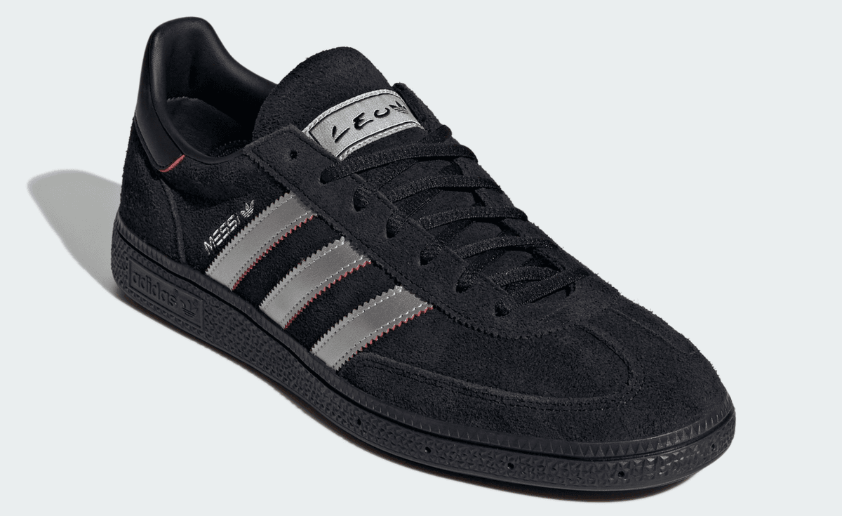 adidas Handball Spezial in black and silver from the Leo Messi collaboration, showcasing the iconic court silhouette's minimalist colorway execution