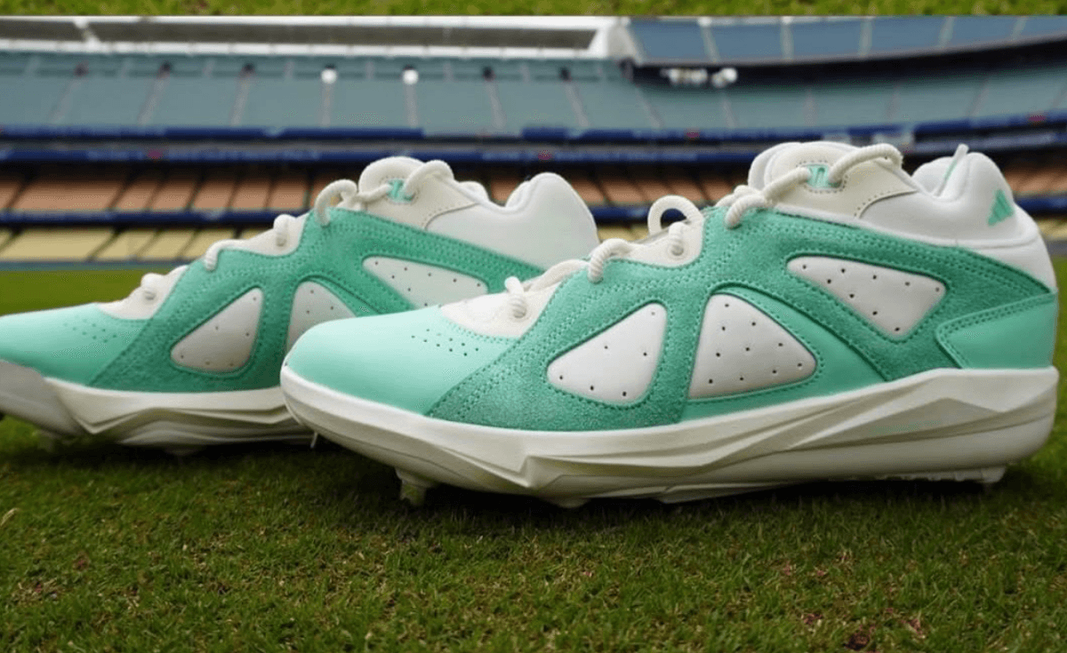 Kiké Hernandez wearing exclusive adidas BadBo 1.0 Low PE cleats in teal and white colorway during Dodgers game