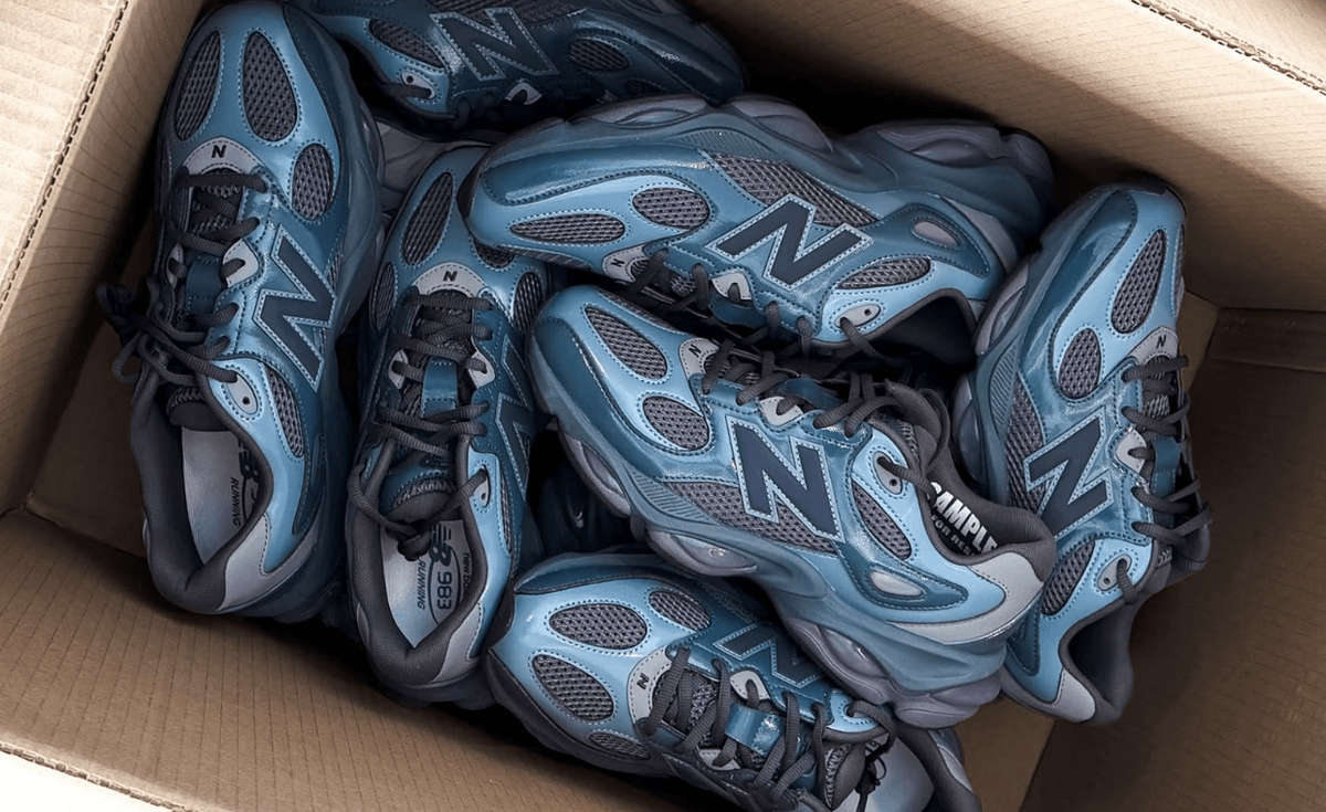 New Balance 983 sample sneaker in steel grey mesh with dual-tone blue overlays and angular midsole structure