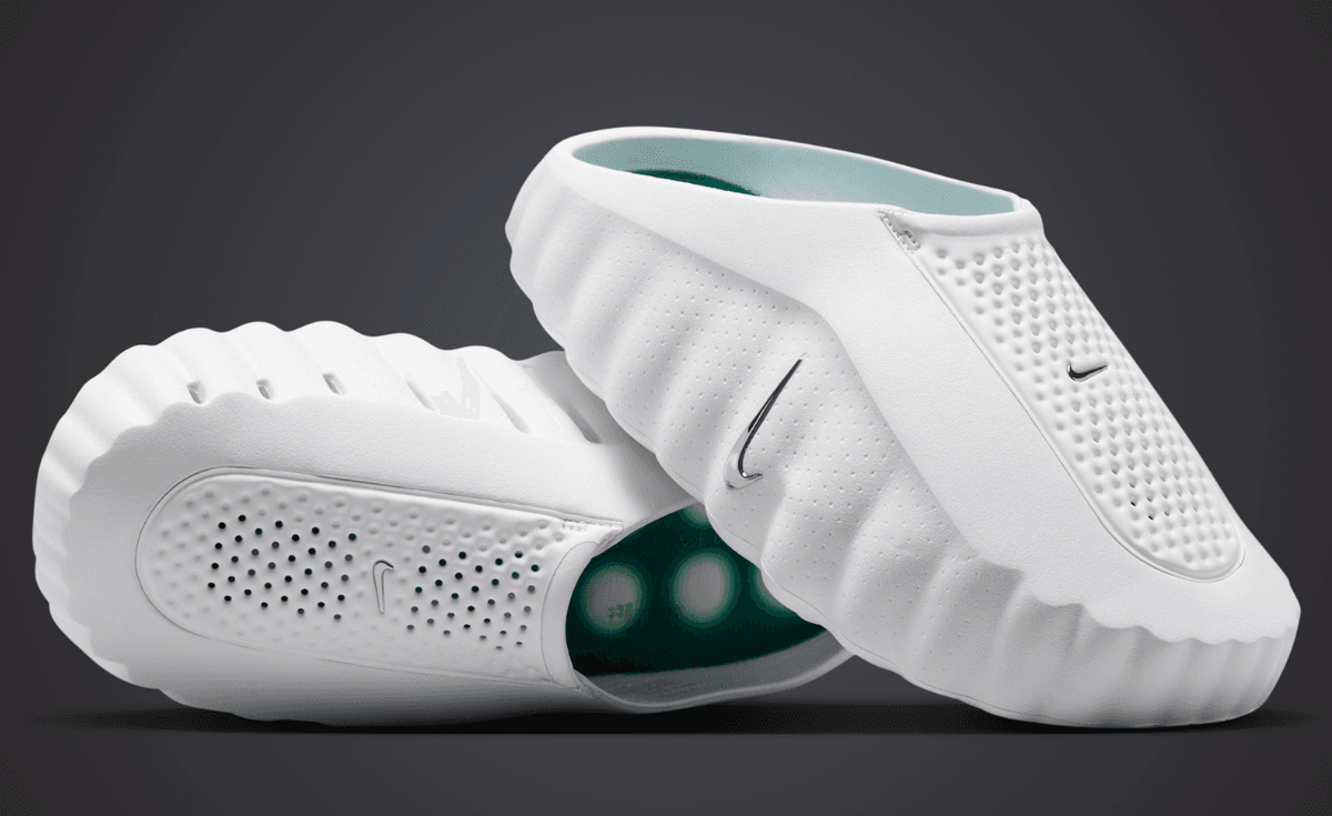 Nike Mind 001 in clean white colorway, shown from lateral angle with minimalist design aesthetic
