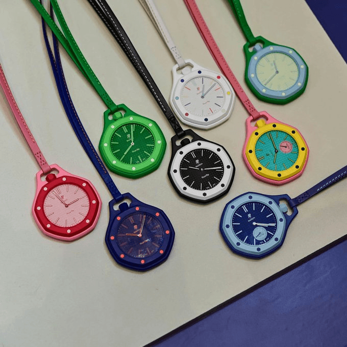 Swatch x Audemars Piguet Royal Pop collection — eight colorways arrayed on a tabletop.