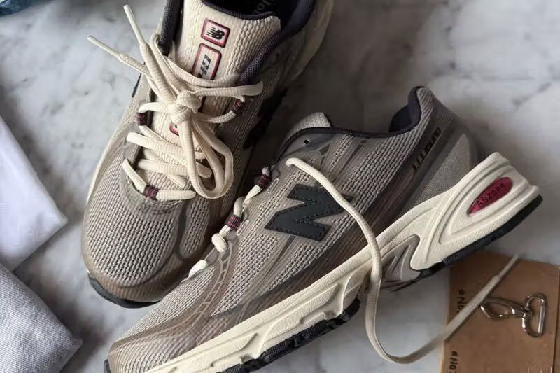 JJJJound x New Balance 740 Taupe sneaker, showing the minimalist Taupe colorway on the retro 2000s running silhouette