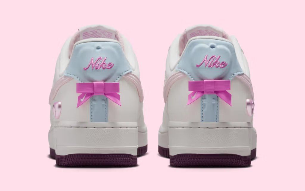 Nike Air Force 1 Low Valentine's Day 2026 in romantic colorway, full-grain leather construction, lateral and medial side view