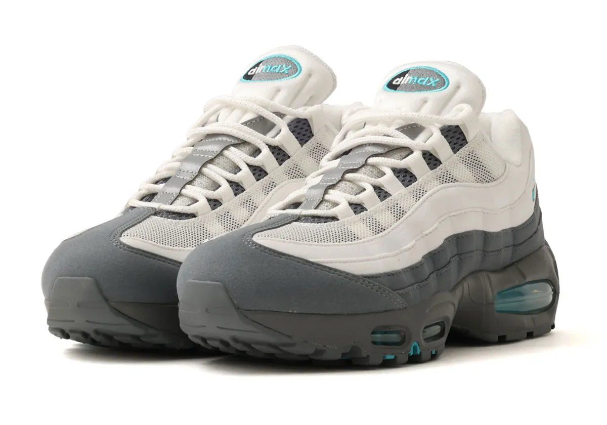 Nike Air Max 95 in Dark Smoke Grey and Summit White with Dusty Cactus teal accents on Swoosh and Air units