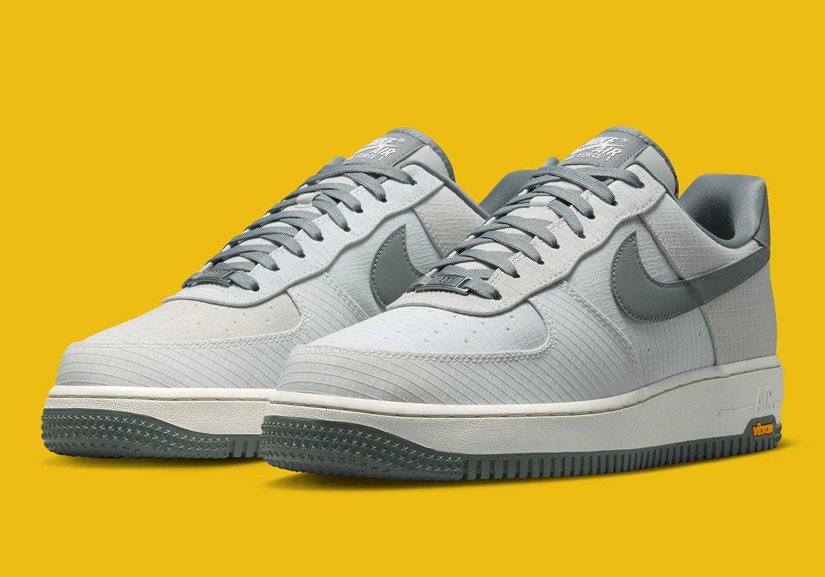 Nike Air Force 1 featuring Vibram outsole technology in neutral colorway, detail shot showing grip-focused rubber sole pattern