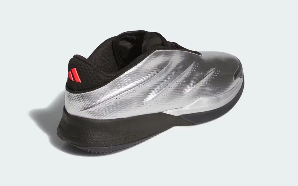 Adidas Crazy Energy+ sneaker featuring aggressive geometric design with bold color blocking and responsive cushioning construction