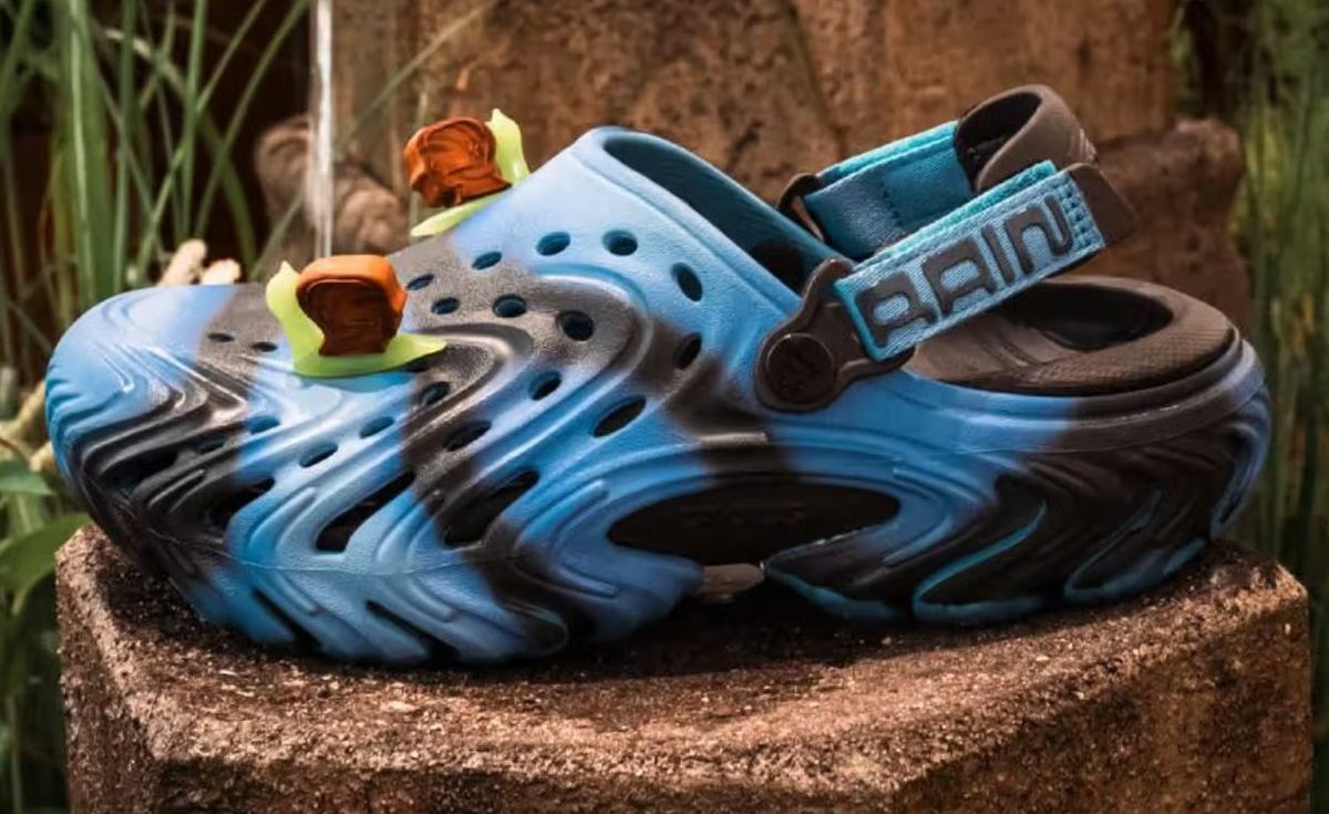 Brain Dead x Crocs Echo II in tide-pool blue and black with co-branded heel strap and neon green Jibbitz