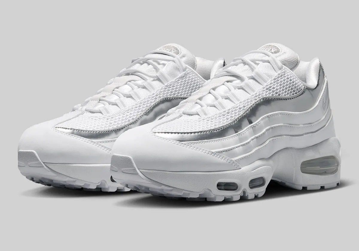 Nike Air Max 95 in pure white with metallic silver accents on mudguard and visible Air Unit