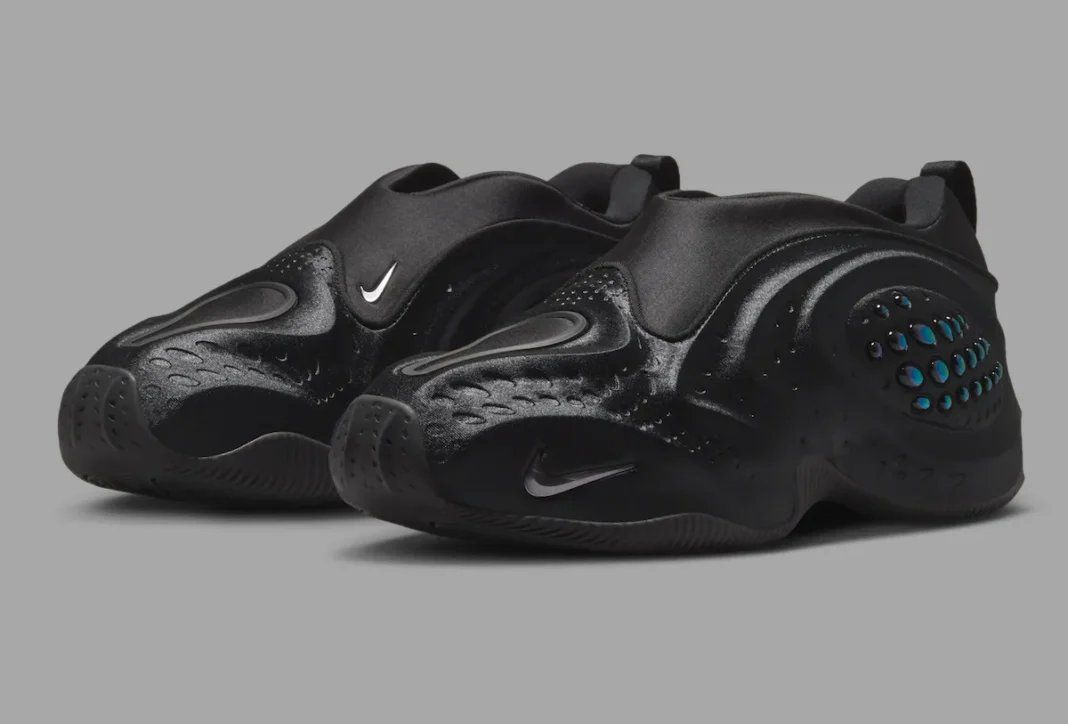 Nike First Sight Shadow in Black with Metallic Dark Grey accents, showing molded upper and sculptural texture details