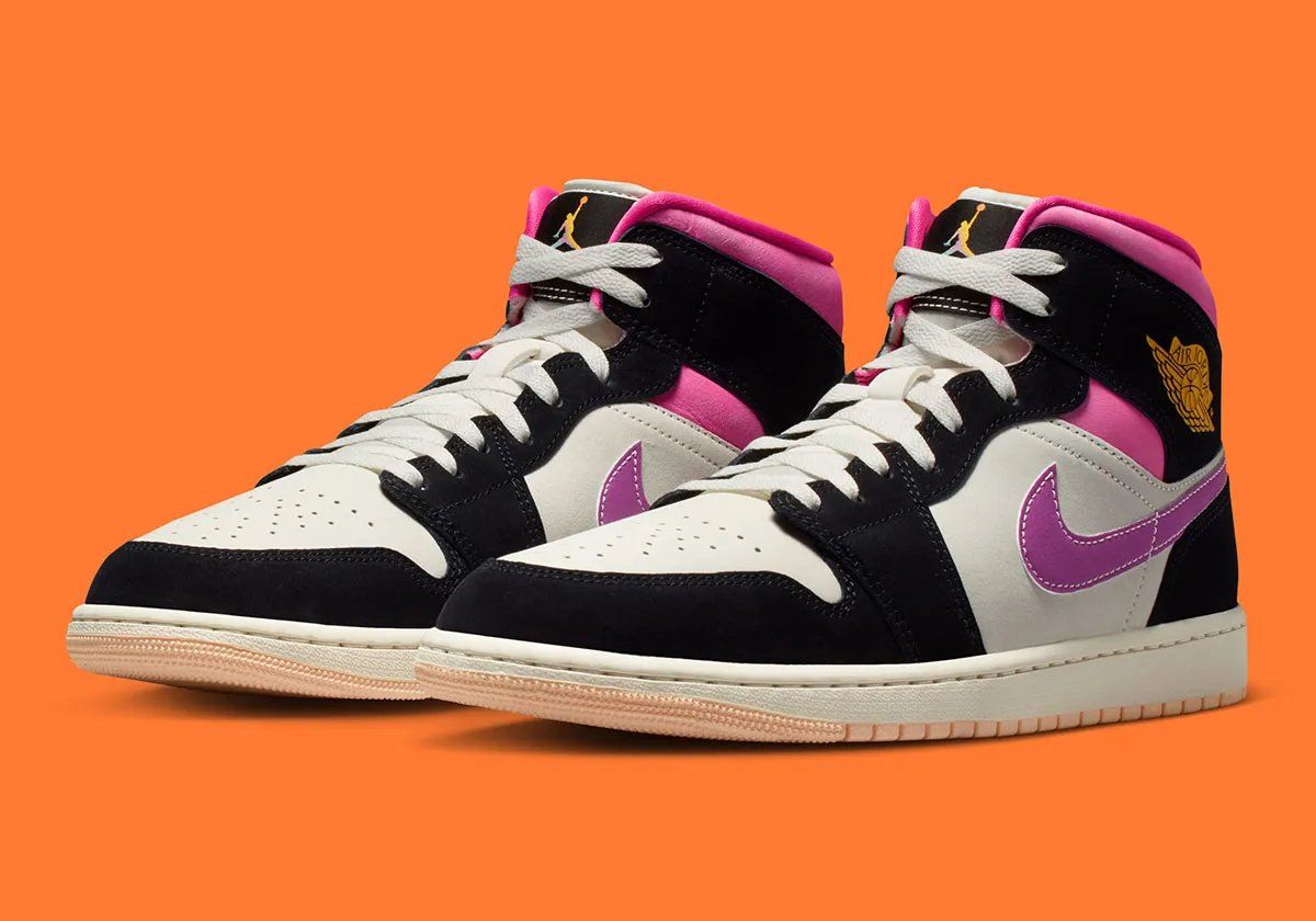Air Jordan 1 Mid in Dunkin' Donuts-inspired orange and pink colorway, showing leather upper and classic silhouette