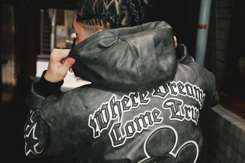 Adidas Mickey Mouse Dreams Jacket in black with oversized Mickey Mouse graphic on back and full-zip closure