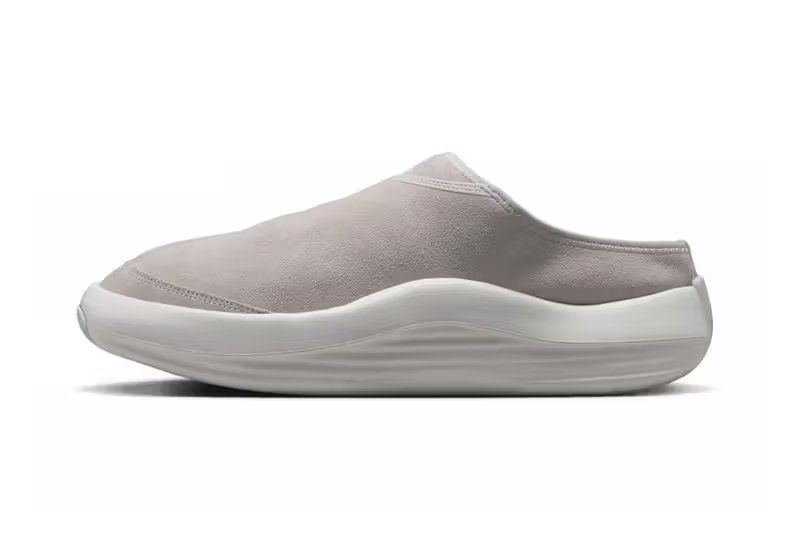Jordan Future Mule in Light Iron Ore colorway with white and medium brown accents, backless slip-on silhouette