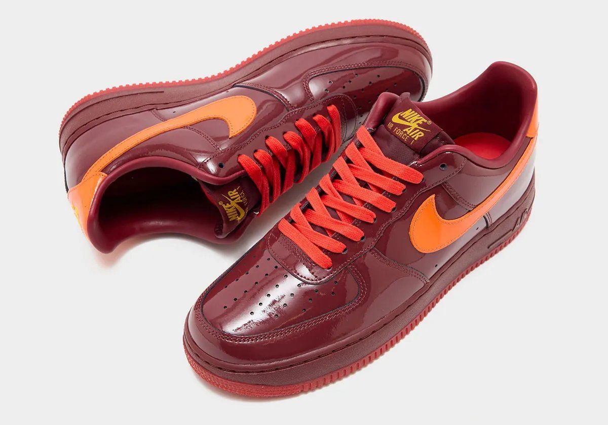 Nike Air Force 1 Patent in varsity red with high-gloss finish, white midsole and rubber toe cap