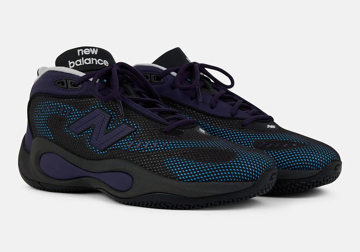New Balance P400 in Black/Boysenberry colorway with Fresh Foam X cushioning, side view