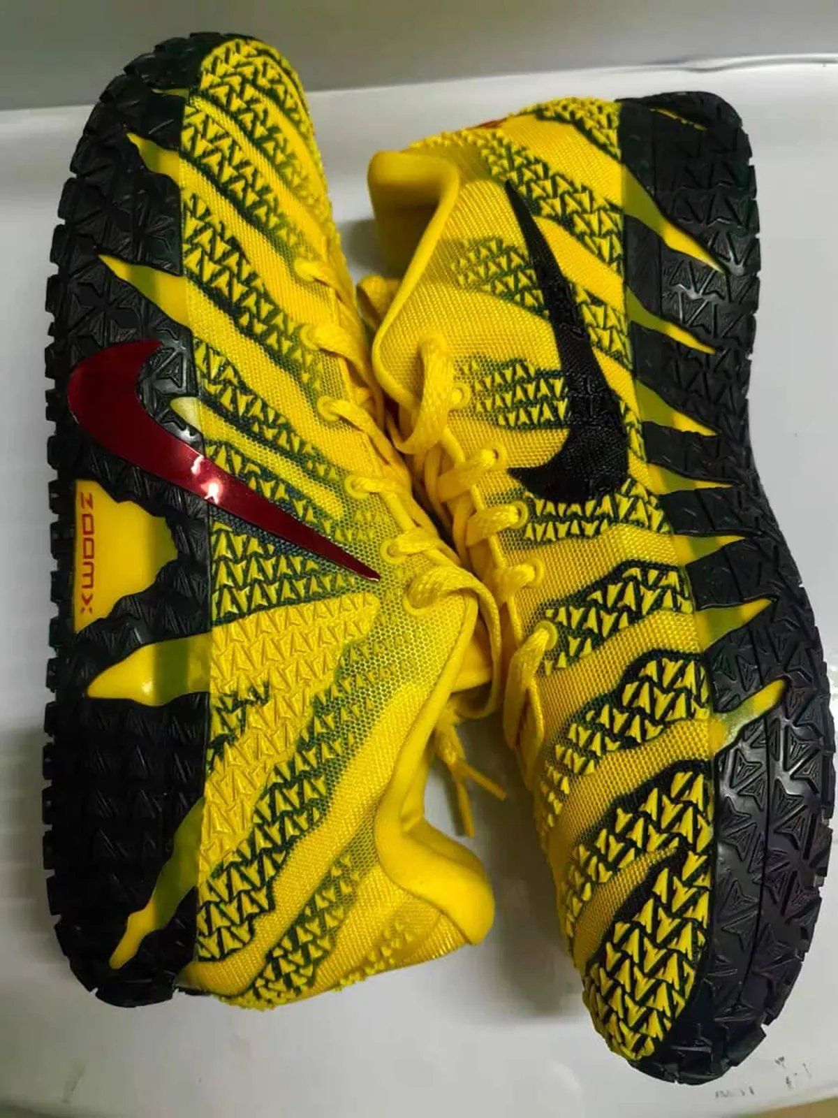 Detailed product imagery of the Nike Ja 3 'Let Me Be Ja' colorway showing the full silhouette from multiple angles