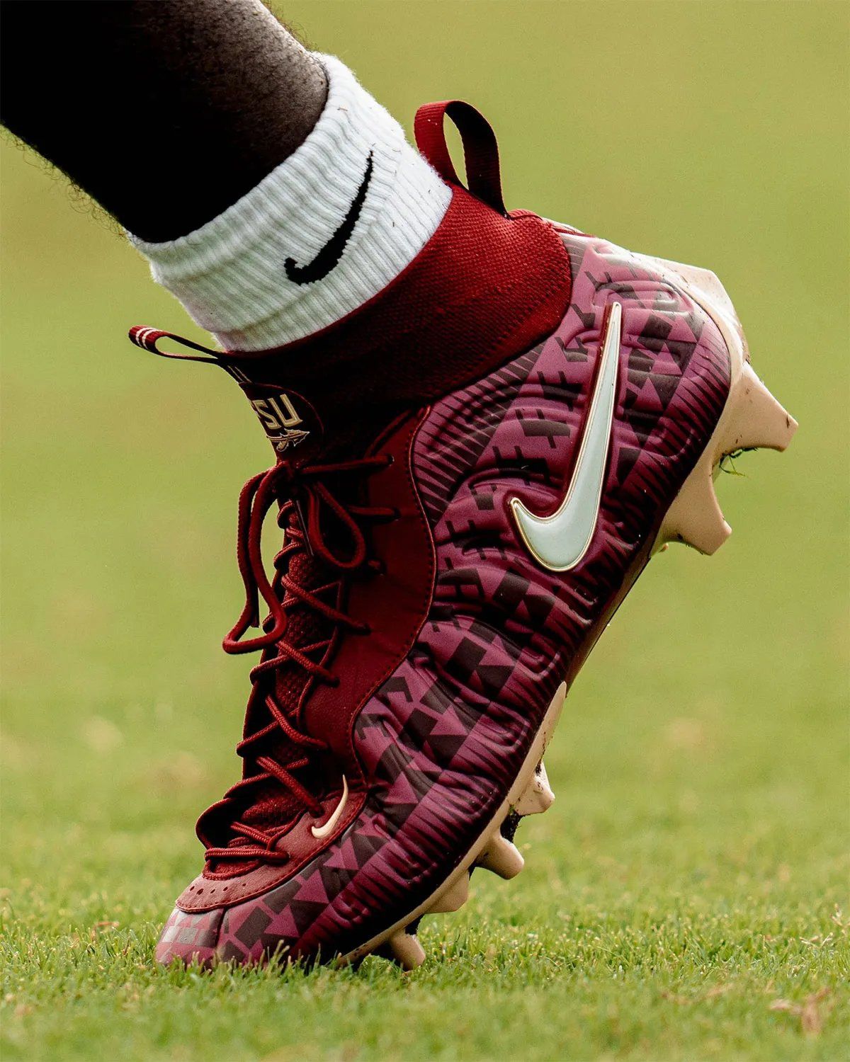 Nike Vaporposite Pro PE in maroon with gold accents, designed for Florida State University football