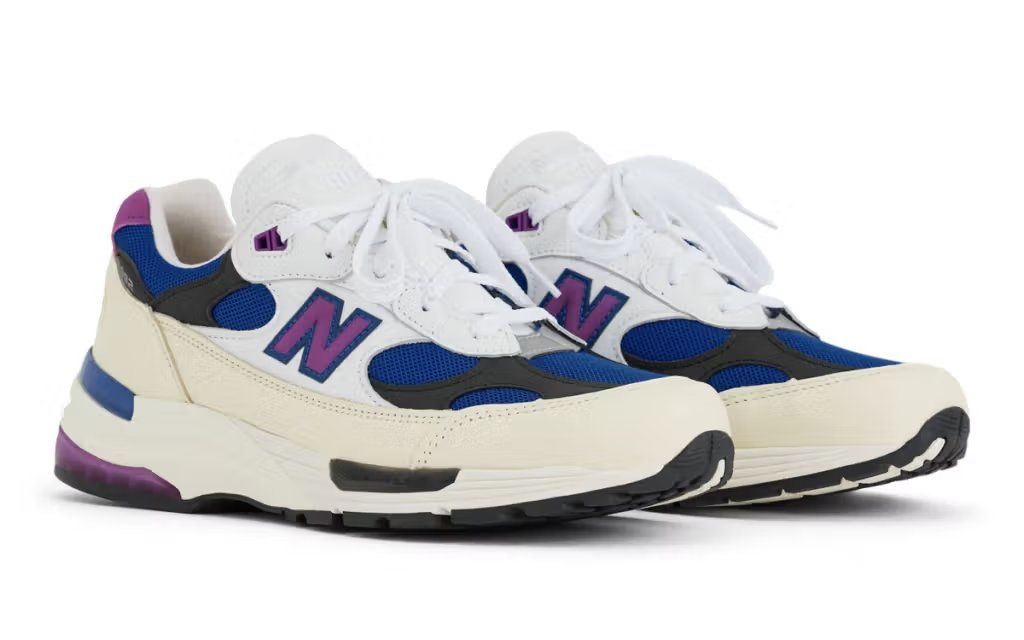 New Balance 992 in Team Royal and Purple Fuchsia colorway, showcasing dual-tone blocking on premium canvas and mesh upper