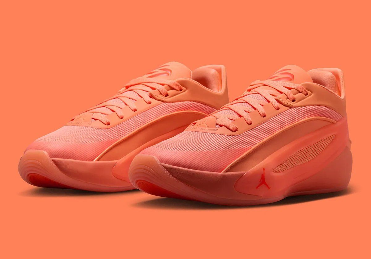 Jordan Luka 5 in Orange Pulse and Hyper Crimson colorway, side profile view