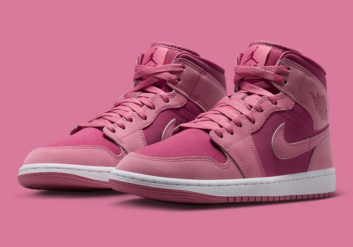 Air Jordan 1 Mid in Desert Berry and Sweet Beet colorway, showing mauve pink overlays and burgundy accents on the toe box and collar
