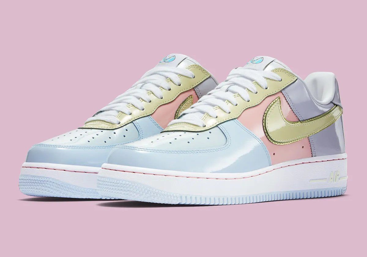 Nike Air Force 1 Low Easter in Titanium blue, Lime Ice green, and Storm Pink patent leather with cracked egg graphic details