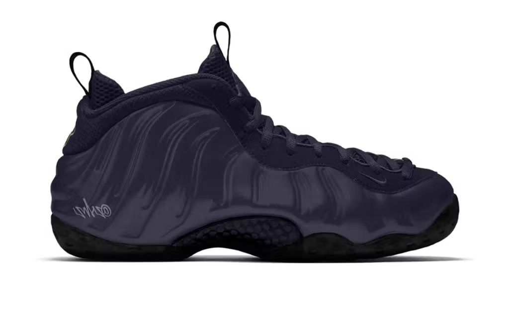 Nike Foamposite One in Obsidian colorway, showcasing the signature molded foam construction for the model's 30th anniversary release