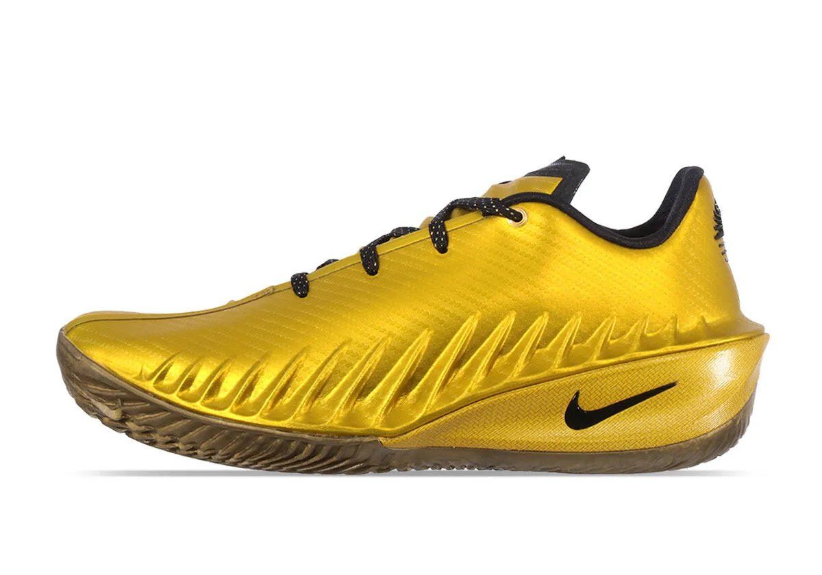 Nike GT Cut 4 in Jordan Poole's gold colorway with black trim and bronze translucent outsole