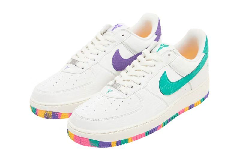 Kobe Bryant Nike Air Force 1 Low in Sail with mismatched Emerald Green and Hyper Purple accents and confetti-detailed sole