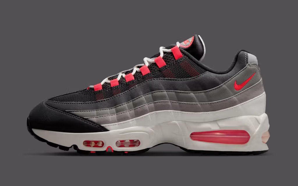 Nike Air Max 95 in Reverse Solar Red colorway, showcasing the classic silhouette's layered construction and updated color blocking