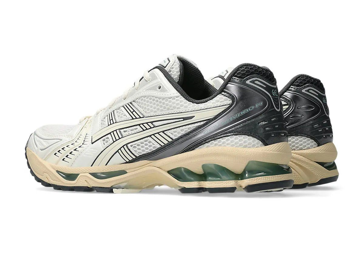 ASICS GEL-Kayano 14 in Cream and Obsidian Grey with jade green GEL cushioning accents, side profile view