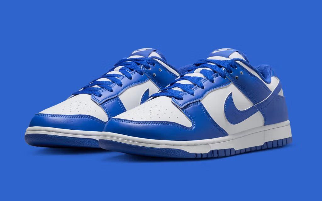 Nike Dunk Low in 'Kentucky' colorway featuring university blue and white upper, commemorating the silhouette's 40th anniversary