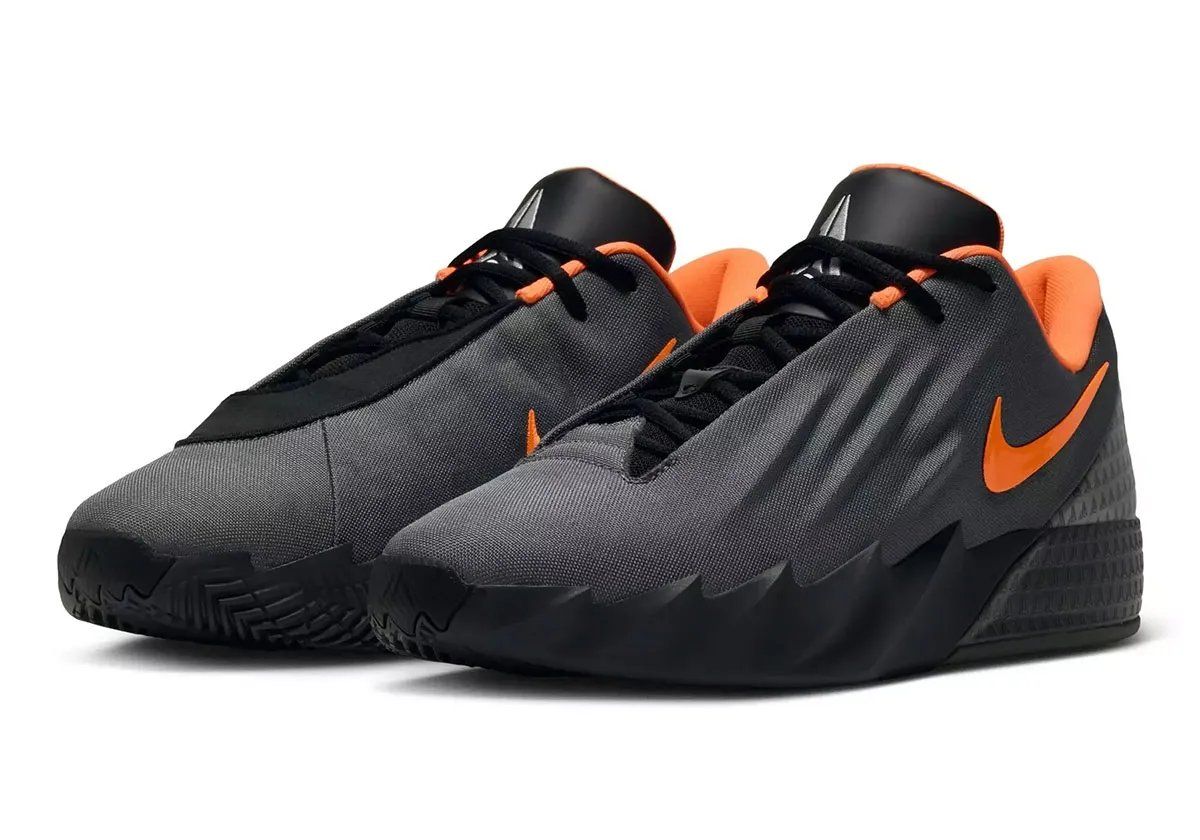 Nike Twelve Time in Black/Iron Grey/Orange colorway, Ja Morant signature takedown basketball shoe with burnt orange Swoosh and matte grey upper