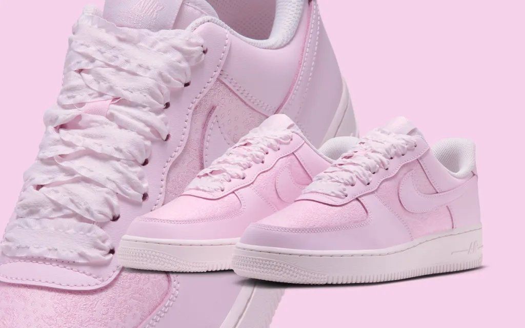 Nike Air Force 1 Low in pink jacquard with ribbon laces, angled side view