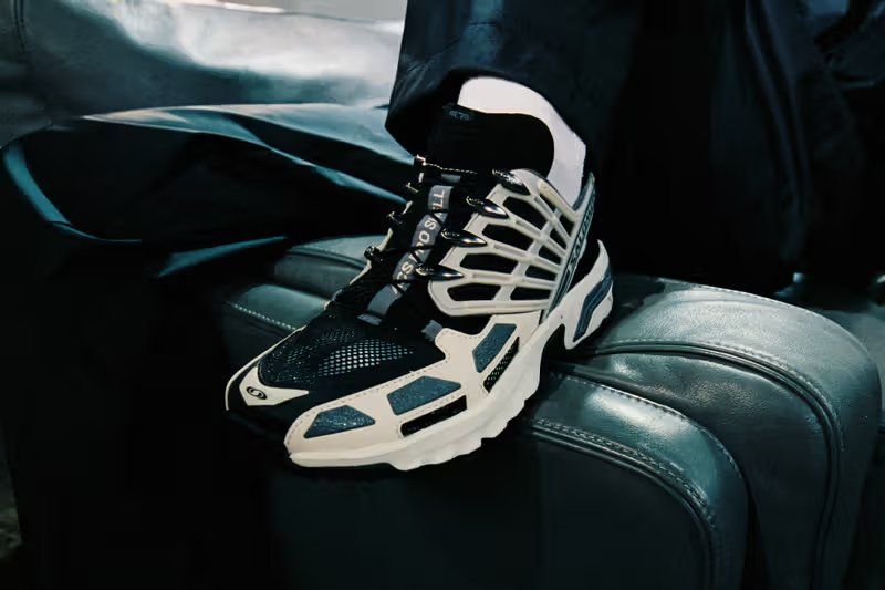 Salomon ACS Pro Shell in Rainy Day gray and black colorway, side profile view