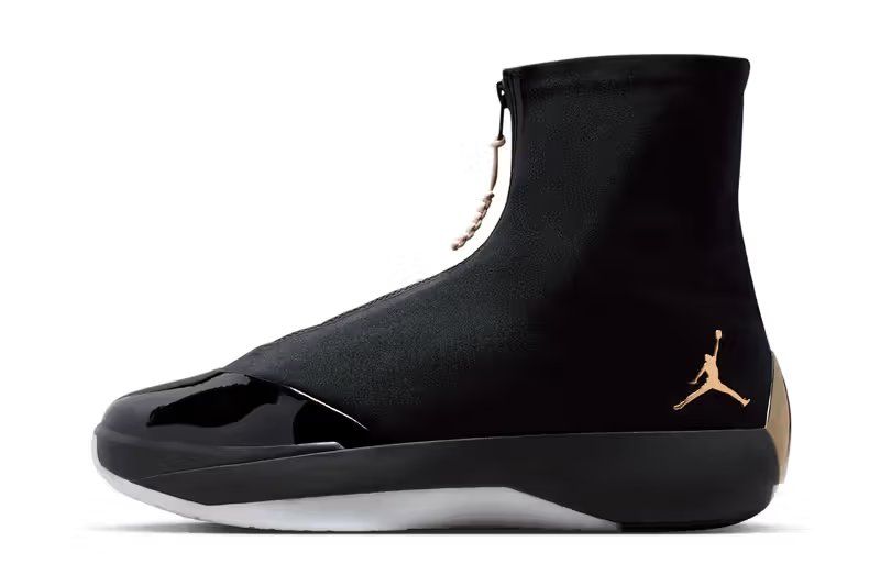 Air Jordan 4028 in Black with metallic gold and pearl white detailing, shown from lateral side profile