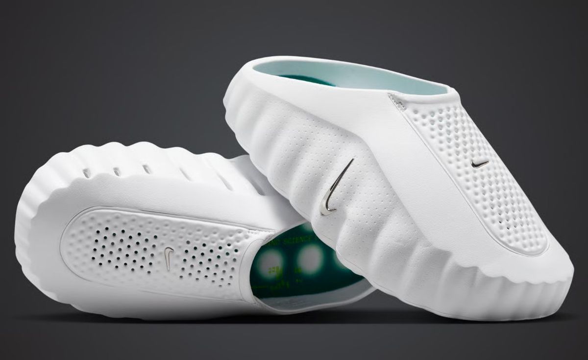 Nike Mind 001 in clean white colorway, shown from lateral angle with minimalist design aesthetic