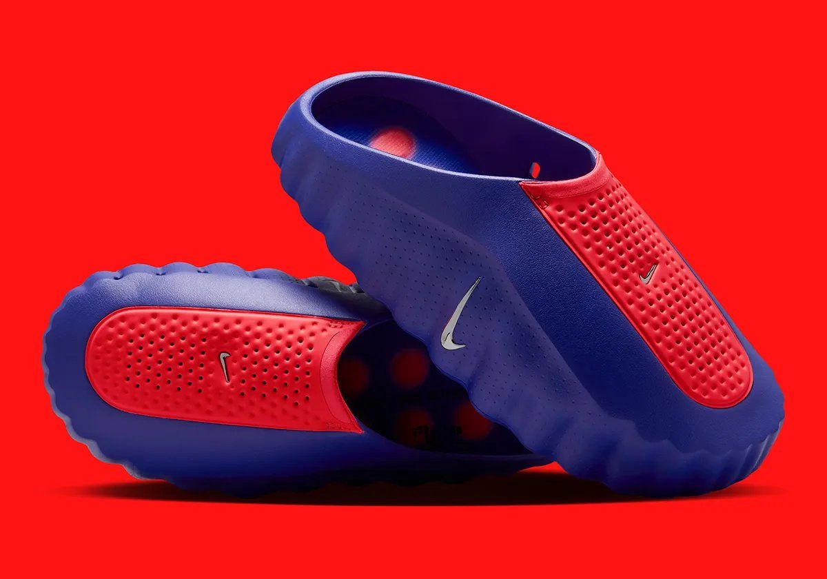 Nike Mind 001 Indigo Burst Hyper Punch colorway showcasing the neuroscience-backed design with circular nodes and vibrant blue and pink colorway