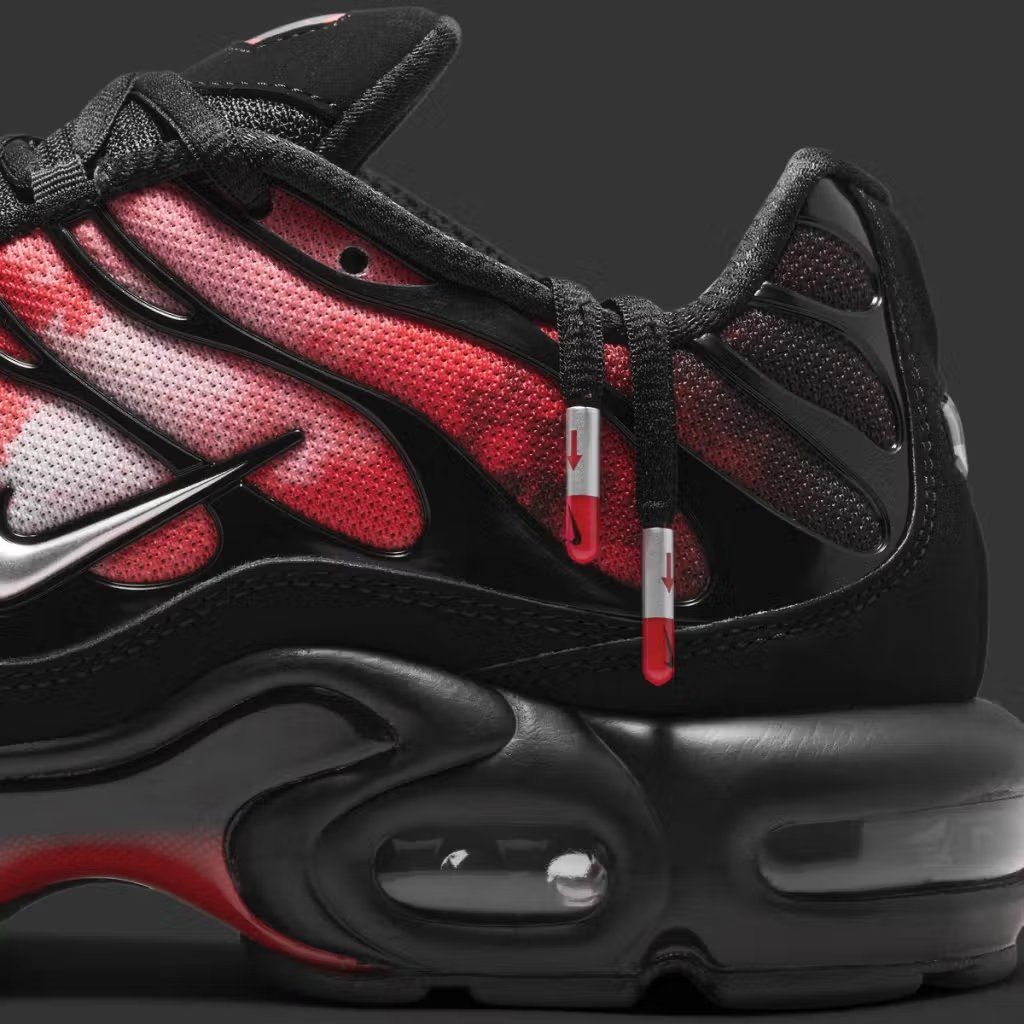 Nike Air Max Plus in team-inspired colorway featuring bold athletic palette and visible Max Air unit