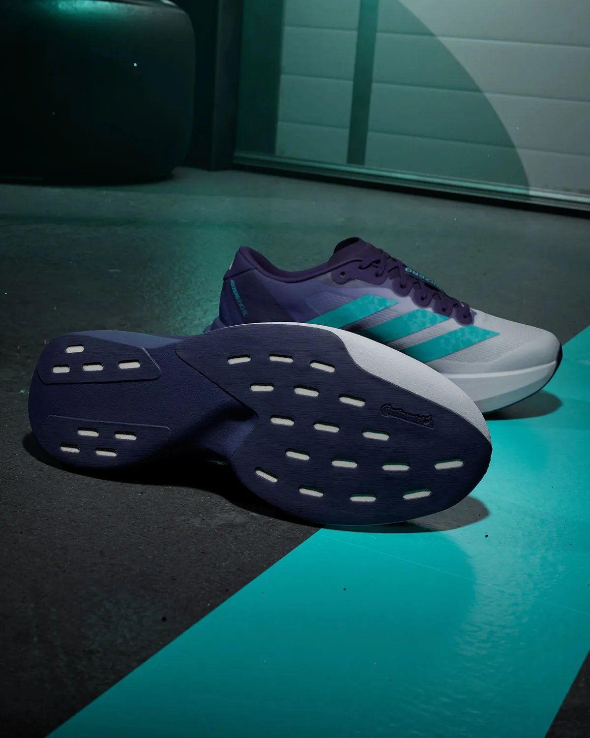 Mercedes AMG Petronas F1 x adidas adiZero EVO SL in Vanda orchid purple gradient with hi-vis teal Three Stripes accents
