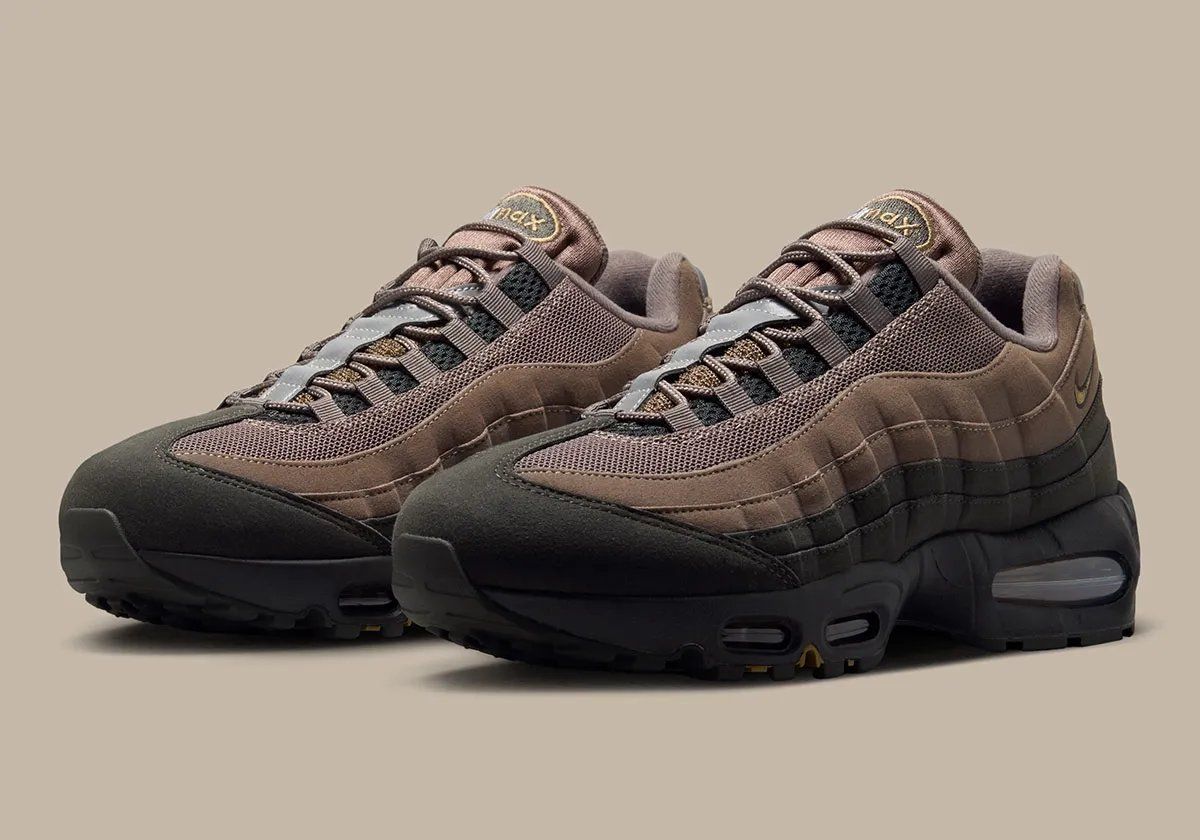 Nike Air Max 95 in Mink Brown gradient with chocolate ombre upper and blue Air units, shown from lateral side view