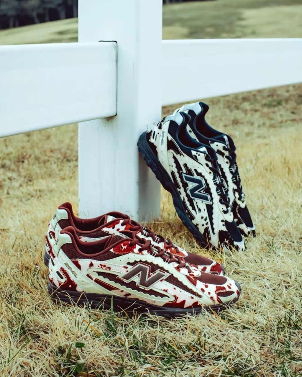 Atmos x New Balance 204L sneaker in cow print colorway, overhead view showing the upper and toe box detailing