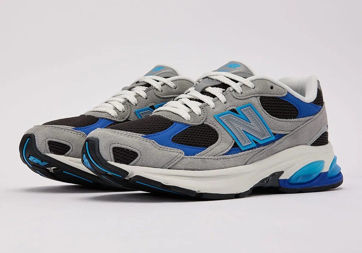 New Balance 2010 in grey suede and black mesh with royal blue and baby blue accents, retail colorway