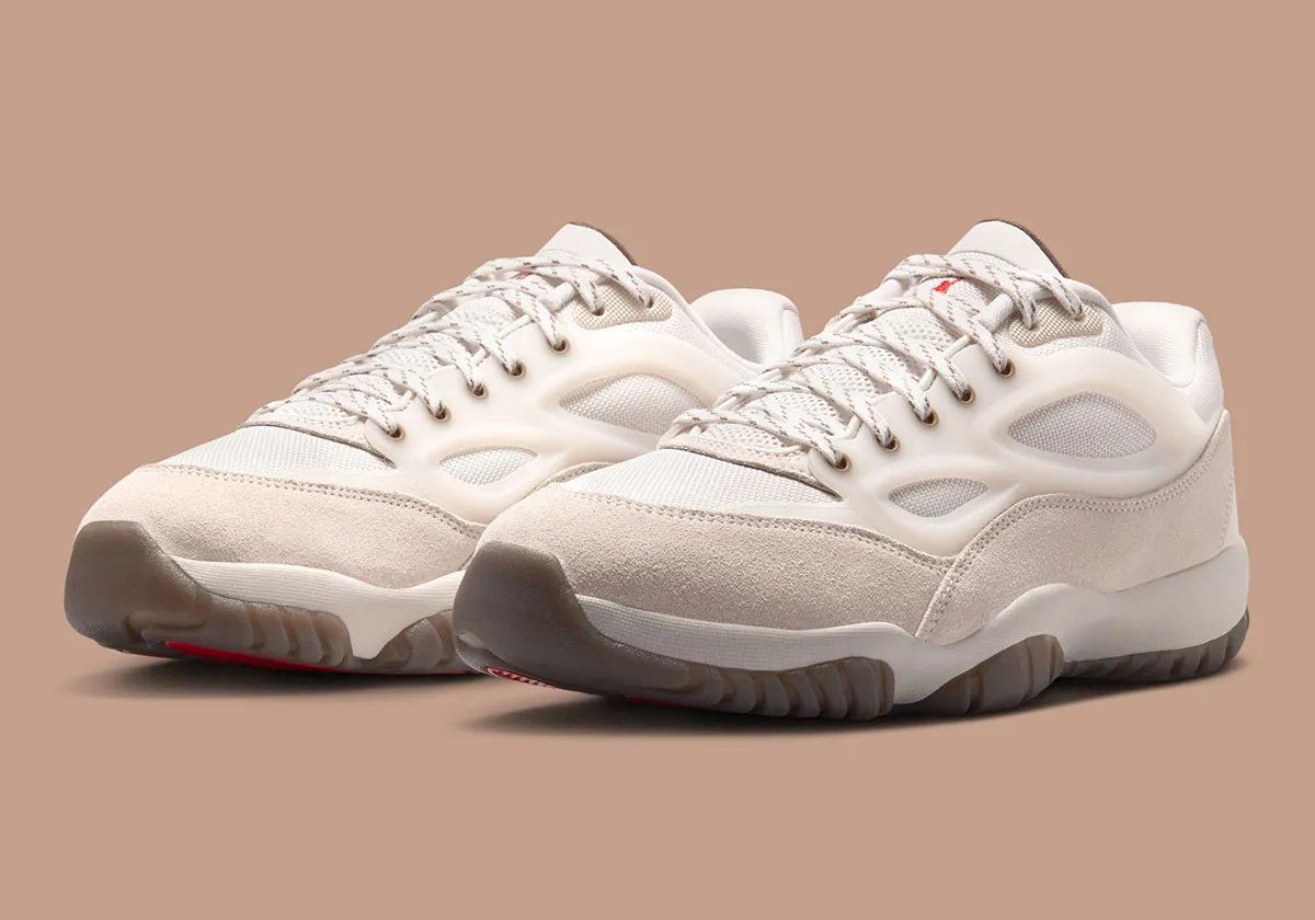 Jordan Dimension 95 Phantom showing perforated TPU cage, suede toe cap, and Red Swan outsole detailing