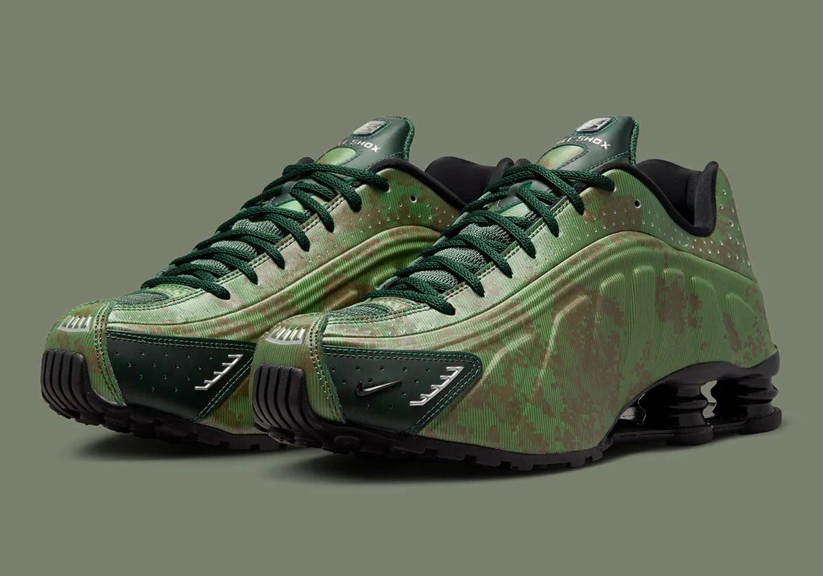 Nike Shox R4 in Team Kelly Green and Rough Green camo with all-black Shox cushioning unit and tactile mini Swoosh detail