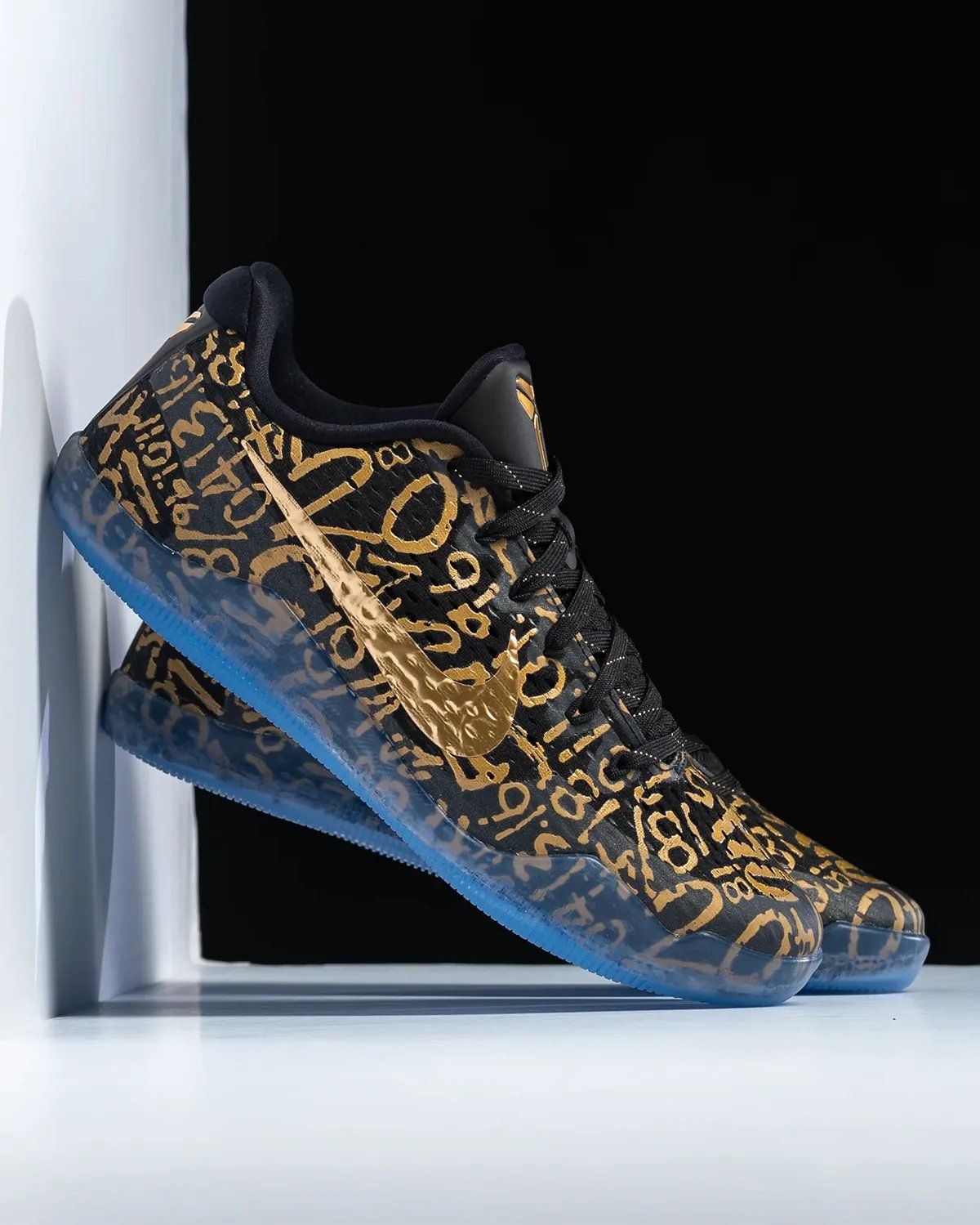 Nike Kobe 11 EM Protro 'Mamba Day' featuring gold accents commemorating Kobe Bryant's career milestones