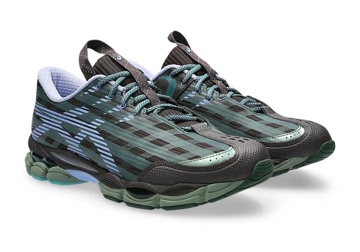 Kiko Kostadinov x ASICS US-8 SJ33 in Roasted Coffee and Periwinkle Blue colorway, showcasing checkered upper and oversized Tiger Stripe detailing