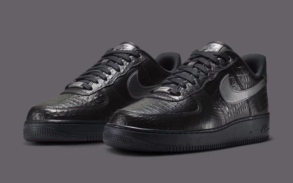 Nike Air Force 1 Low in Triple Black Croc, featuring crocodile-embossed overlays across the lateral and medial panels